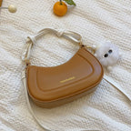 Doll-Decor Dumpling Shoulder Bag