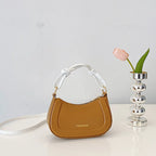 Doll-Decor Dumpling Shoulder Bag