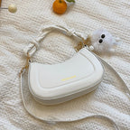 Doll-Decor Dumpling Shoulder Bag