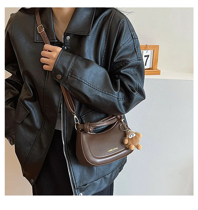 Doll-Decor Dumpling Shoulder Bag