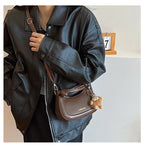 Doll-Decor Dumpling Shoulder Bag