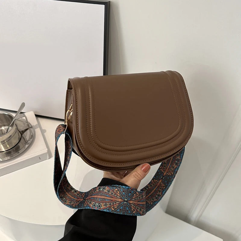Wide Strap Saddle Phone Purse