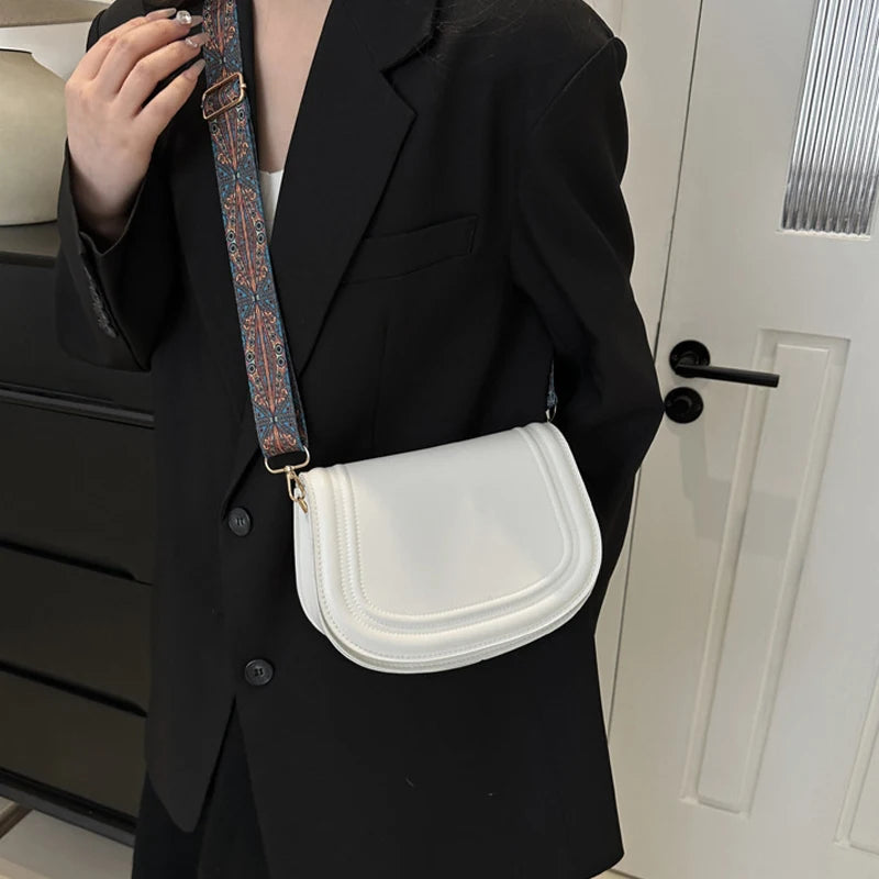 Wide Strap Saddle Phone Purse