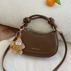 Doll-Decor Dumpling Shoulder Bag