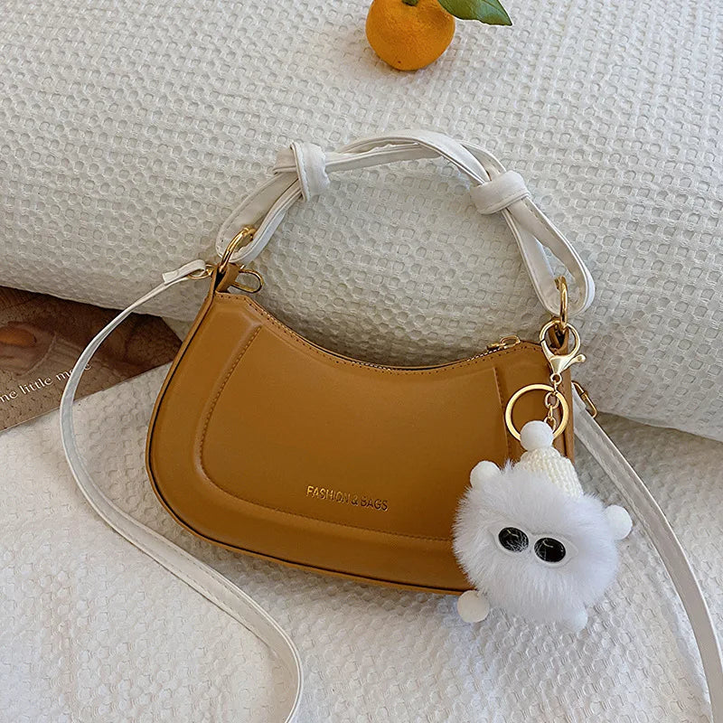 Doll-Decor Dumpling Shoulder Bag