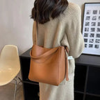 Lock-Detail Bucket Crossbody Bag