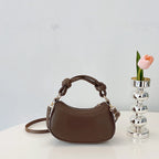 Doll-Decor Dumpling Shoulder Bag