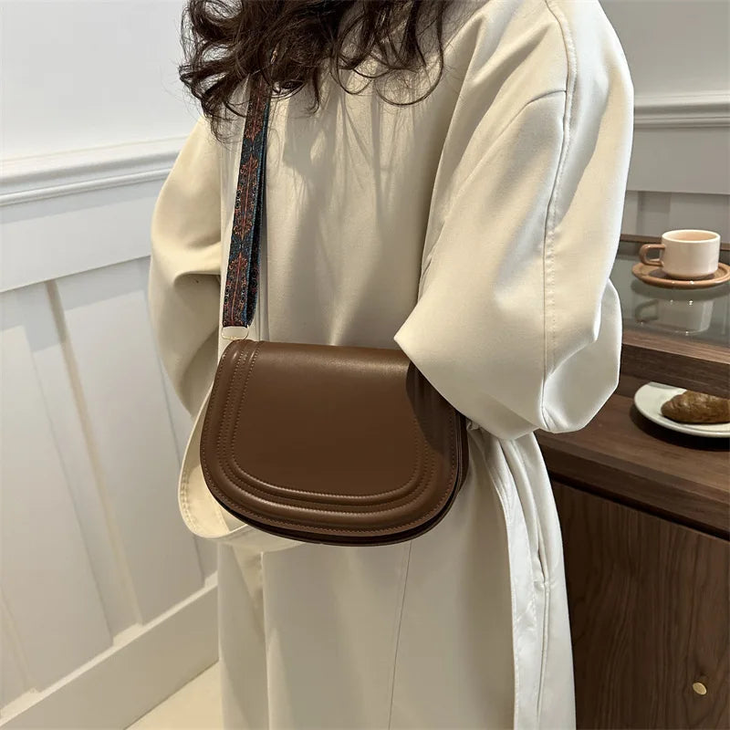 Wide Strap Saddle Phone Purse