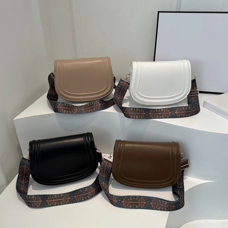 Wide Strap Saddle Phone Purse